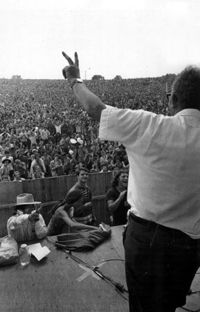 Max Yasgur owner of the Woodstock site & a young Martin Scorsese returns the Peace Sign